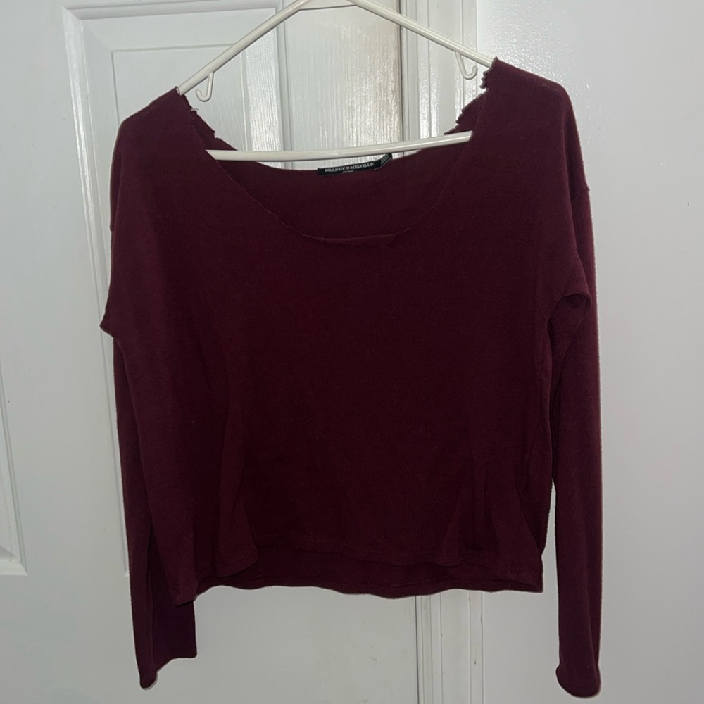 Brandy Melville! worn once distressed collar. Also fits like a one shoulder top.